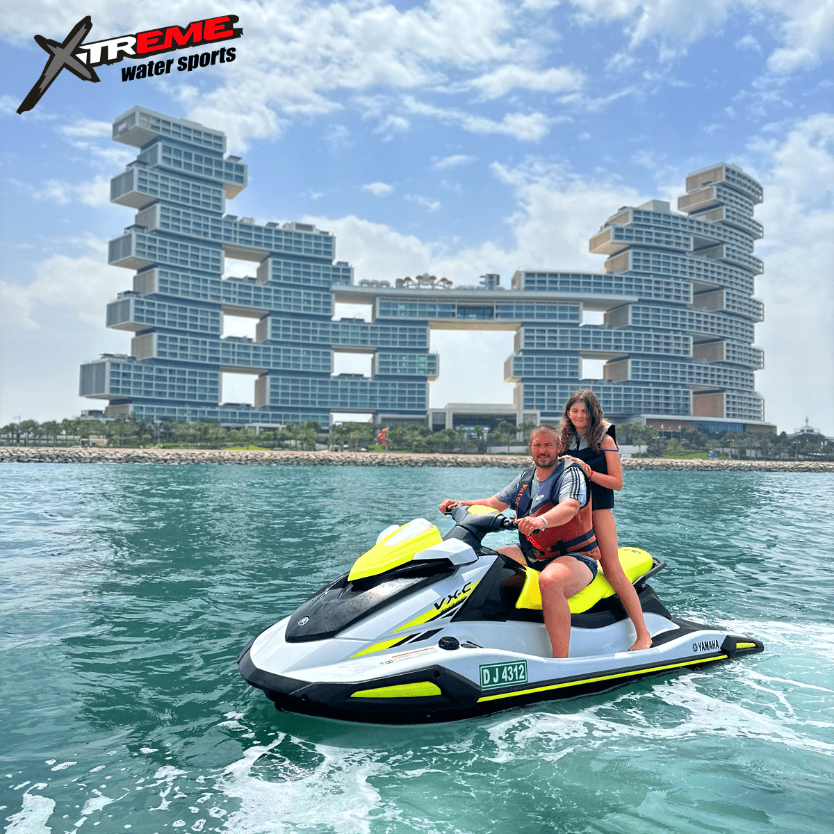 Jet Ski Rider posing with the Atlantis the Royal in the background.
